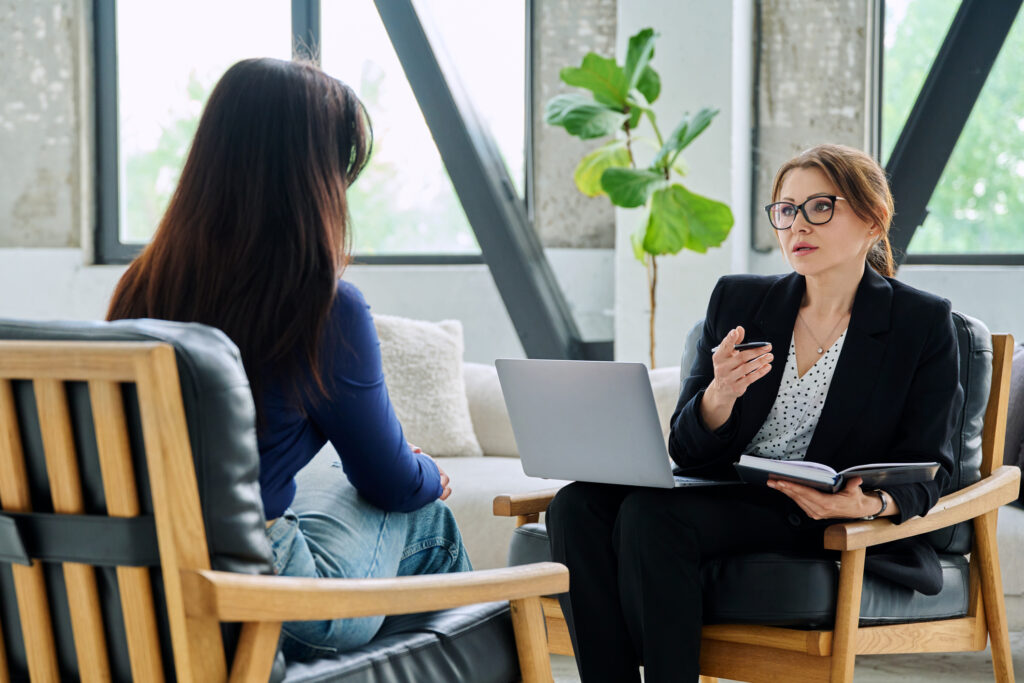 Hypnotherapist with client