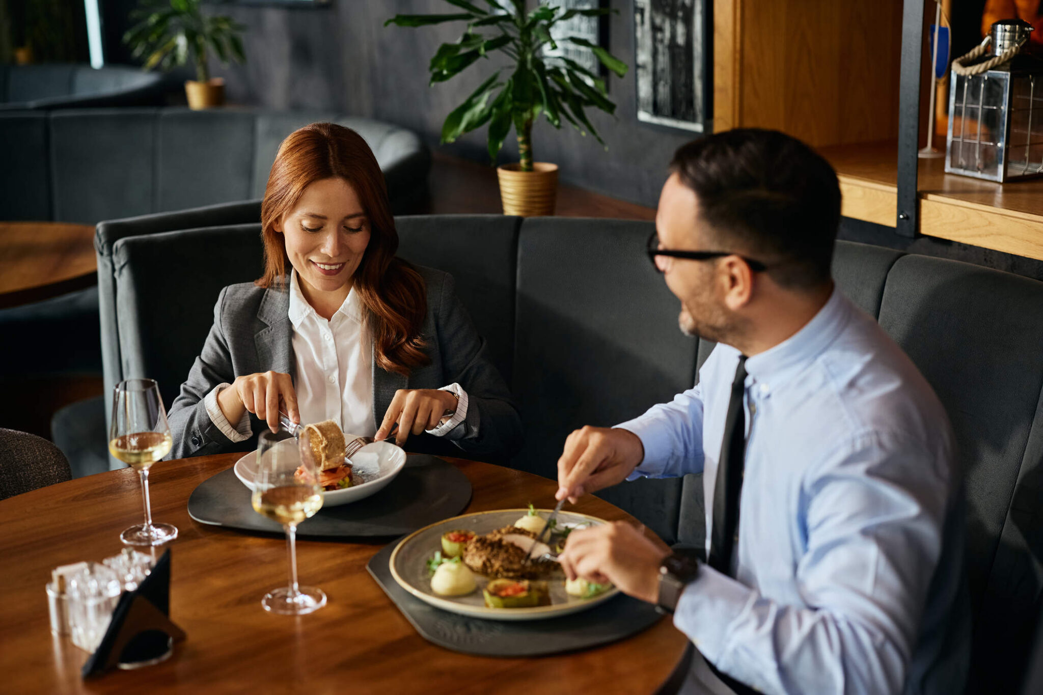 Couple enjoying a relaxed meal together in a restaurant